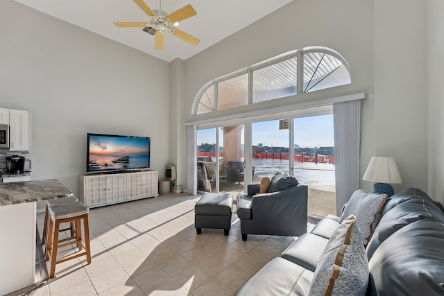 5111 Shawcrest Rd Unit 5111, Lower Township, NJ 08260 - living area featuring high vaulted ceiling, light tile patterned floors, and ceiling fan