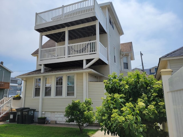 113 W Walnut Ave, North Wildwood, NJ 08260 - view of property exterior featuring a balcony and roof with shingles