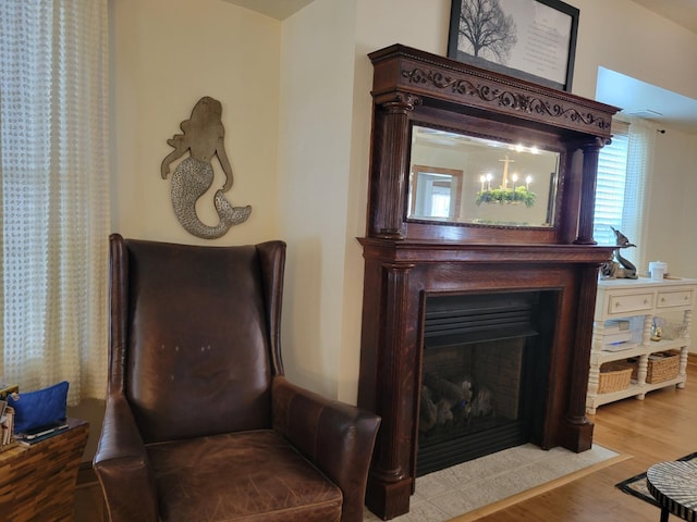 113 W Walnut Ave, North Wildwood, NJ 08260 - living area featuring wood finished floors and a fireplace with flush hearth