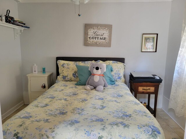 113 W Walnut Ave, North Wildwood, NJ 08260 - bedroom featuring baseboards and tile patterned floors