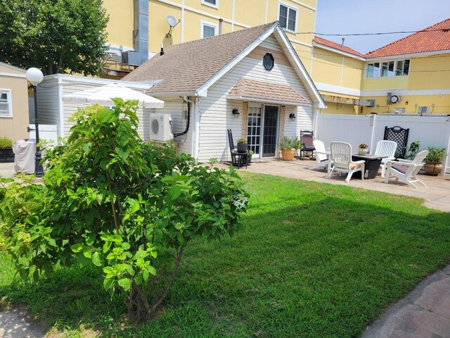 113 W Walnut Ave, North Wildwood, NJ 08260 - rear view of property with a patio