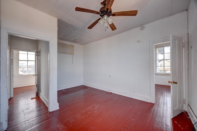 918 Stockton Ave, Cape May, NJ 08204 - spare room with a ceiling fan, dark wood finished floors, a wealth of natural light, and baseboards