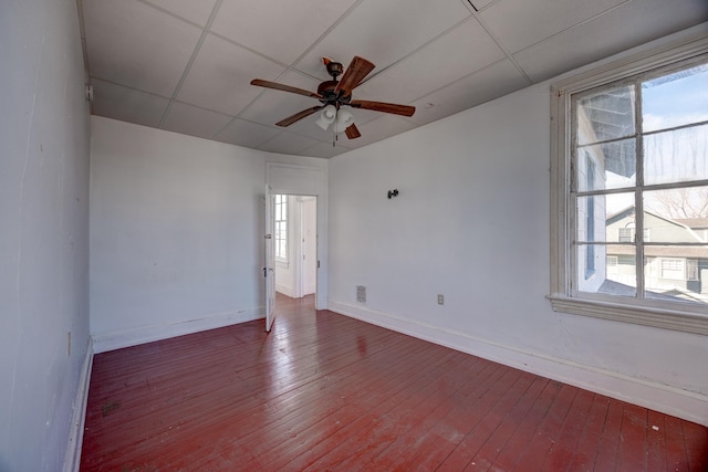 918 Stockton Ave, Cape May, NJ 08204 - empty room featuring a paneled ceiling, wood-type flooring, visible vents, a ceiling fan, and baseboards