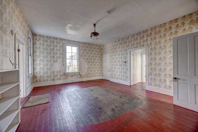918 Stockton Ave, Cape May, NJ 08204 - empty room featuring baseboards, hardwood / wood-style floors, and wallpapered walls