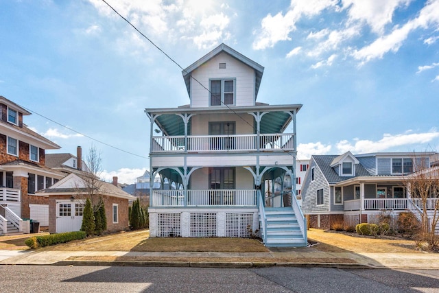 918 Stockton Ave, Cape May, NJ 08204 - view of front of home featuring a porch, a balcony, and stairs