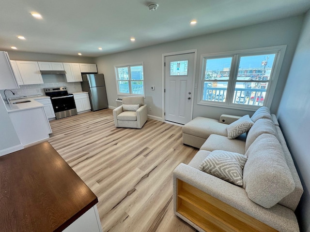 2001 Surf Ave Unit 12, North Wildwood, NJ 08260 - living room with light wood-style flooring and recessed lighting