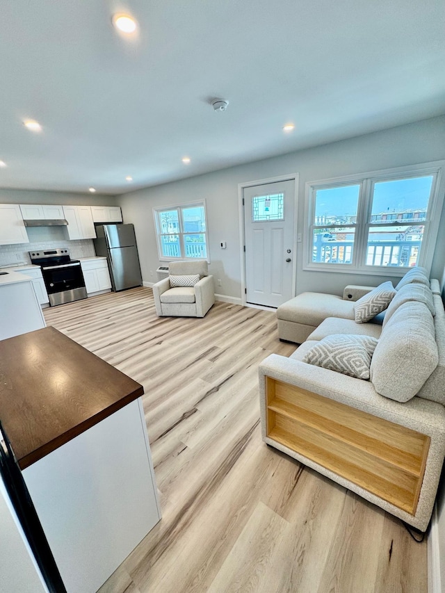 2001 Surf Ave Unit 12, North Wildwood, NJ 08260 - living room with light wood-type flooring and recessed lighting