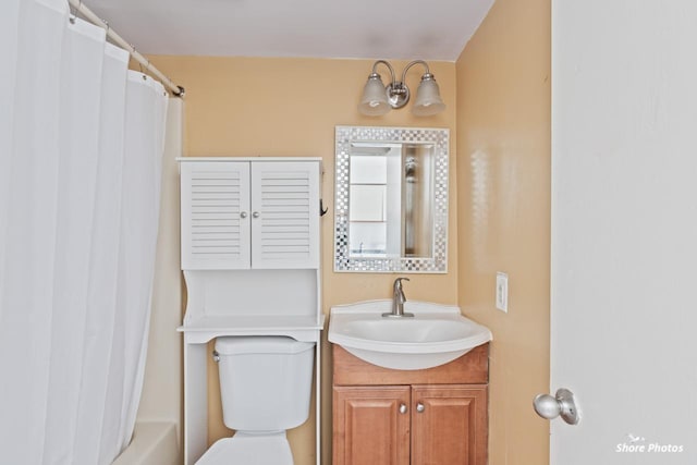 full bathroom with vanity, toilet, and shower / bathtub combination with curtain