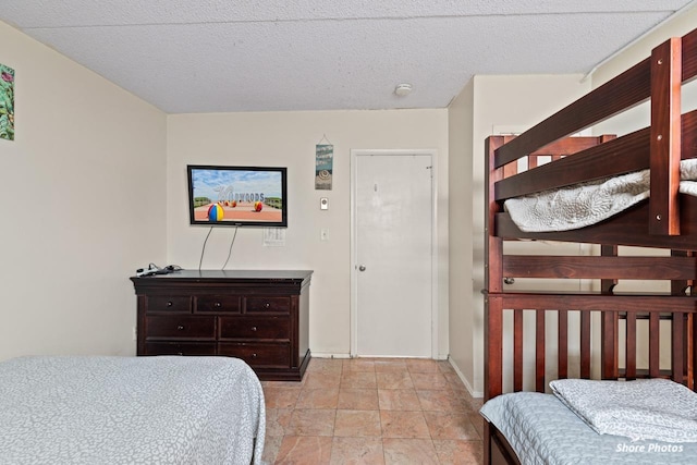 bedroom featuring a textured ceiling