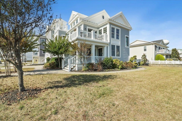 view of front of property featuring a porch and a front yard