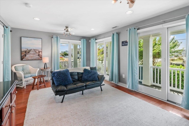 interior space featuring ceiling fan, dark wood-style flooring, and recessed lighting