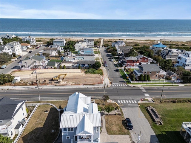 aerial view featuring a water view and a residential view