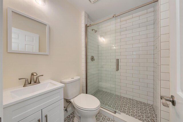 24 Heron Way N, Cape May, NJ 08204 - full bathroom with a stall shower, vanity, and toilet