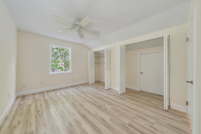 24 Heron Way N, Cape May, NJ 08204 - unfurnished bedroom featuring light wood finished floors, baseboards, a ceiling fan, and two closets