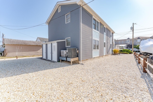 view of home's exterior with central AC unit