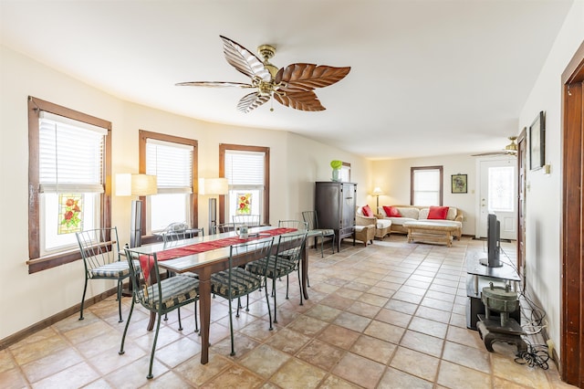dining space with ceiling fan