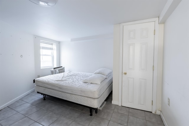 bedroom with a wall unit AC