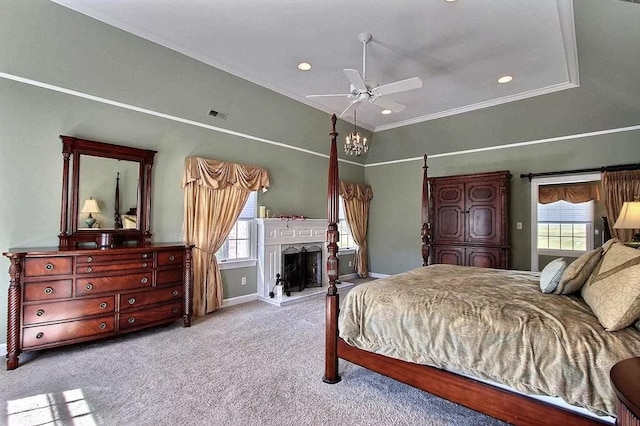 bedroom with ceiling fan, crown molding, and light carpet