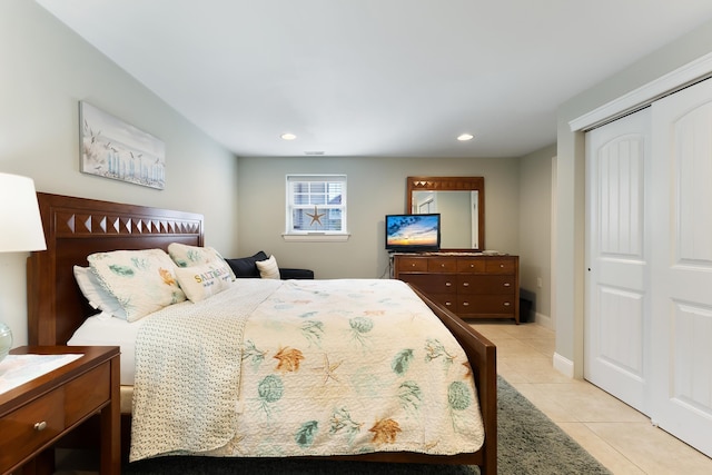 bedroom featuring recessed lighting, visible vents, a closet, and light tile patterned flooring