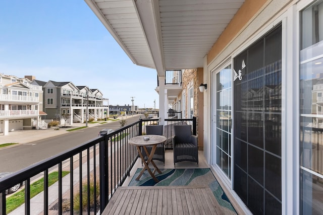 balcony featuring a residential view