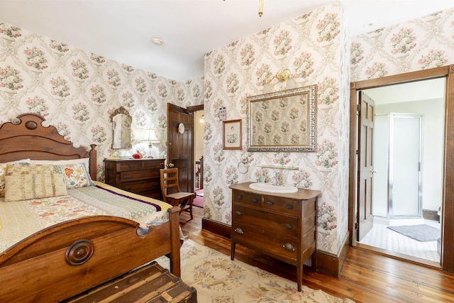 bedroom featuring hardwood / wood-style floors