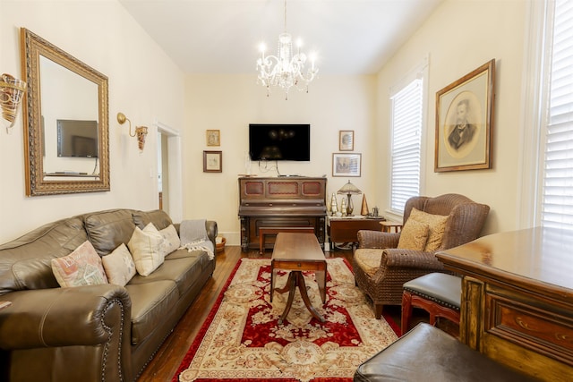 living room featuring a chandelier and hardwood / wood-style flooring