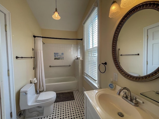 full bathroom featuring tile patterned flooring, shower / bath combo, toilet, and vanity