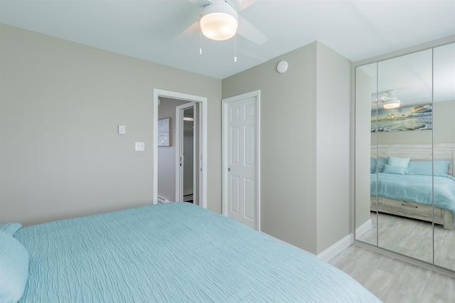 145 Seaview Ct Unit A7, North Wildwood, NJ 08260 - bedroom with a closet, light wood-style flooring, and ceiling fan