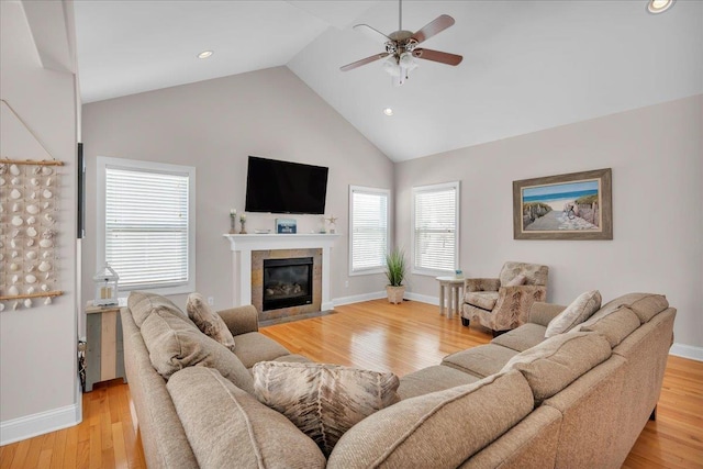 102 E 8 Th Ave, North Wildwood, NJ 08260 - living area with a ceiling fan, light wood-style floors, a tile fireplace, high vaulted ceiling, and recessed lighting