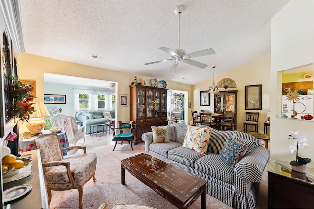 2710 Bybrook Dr, Cape May Beach, NJ 08251 - living area featuring a textured ceiling, a ceiling fan, lofted ceiling, and carpet