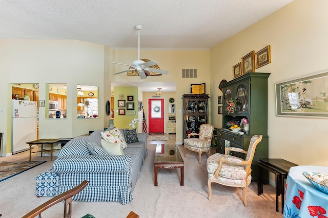 2710 Bybrook Dr, Cape May Beach, NJ 08251 - living area with light colored carpet and a ceiling fan