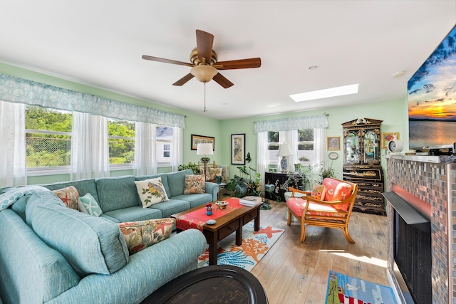 2710 Bybrook Dr, Cape May Beach, NJ 08251 - living area featuring plenty of natural light, a ceiling fan, light wood-style flooring, and a skylight