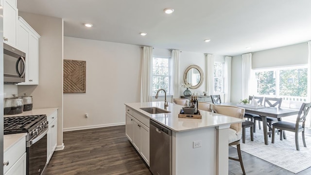 17 N 10th St, Del Haven, NJ 08251 - kitchen with stainless steel appliances, a sink, a kitchen island with sink, dark wood-type flooring, and recessed lighting