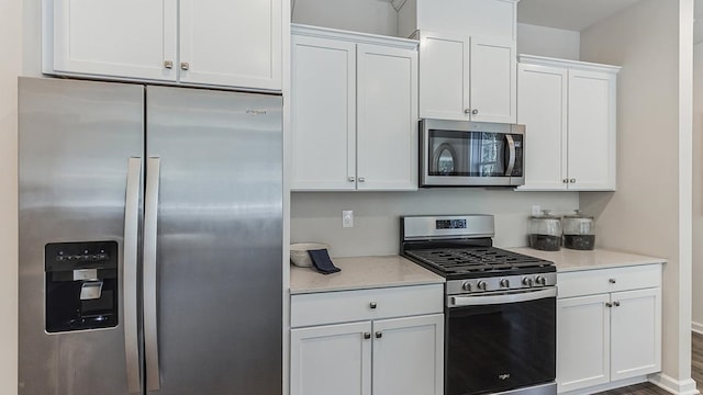 17 N 10th St, Del Haven, NJ 08251 - kitchen with stainless steel appliances, white cabinetry, and light countertops