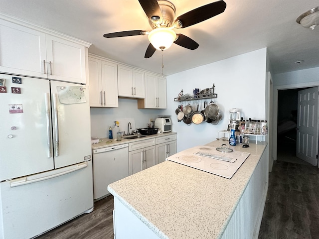 110 S 9th St, Del Haven, NJ 08251 - kitchen featuring white appliances, dark wood-style flooring, white cabinets, and ceiling fan