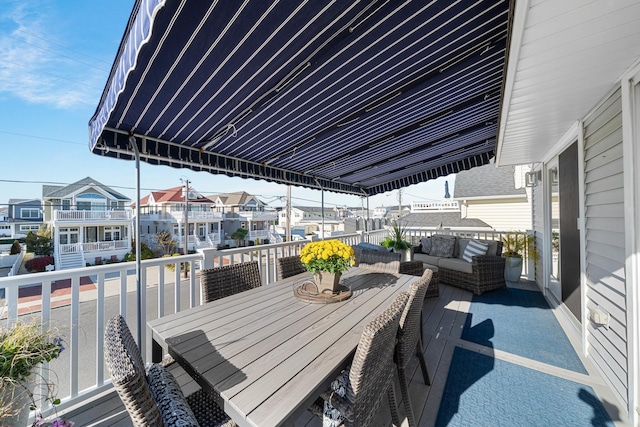 260 83rd St Unit 1, Stone Harbor, NJ 08247 - balcony with a residential view, an outdoor hangout area, and outdoor dining space