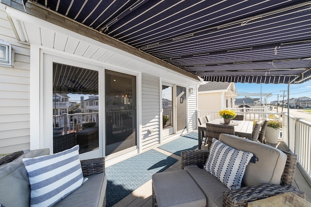 260 83rd St Unit 1, Stone Harbor, NJ 08247 - wooden terrace with outdoor dining area