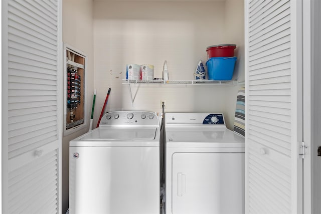 washroom featuring separate washer and dryer