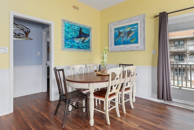 dining room featuring dark wood-type flooring