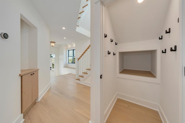 615 W Spruce Ave, North Wildwood, NJ 08260 - hall with light wood-style flooring, baseboards, and stairs