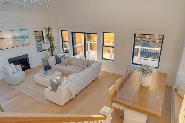 615 W Spruce Ave, North Wildwood, NJ 08260 - living room with a fireplace, baseboards, and wood finished floors