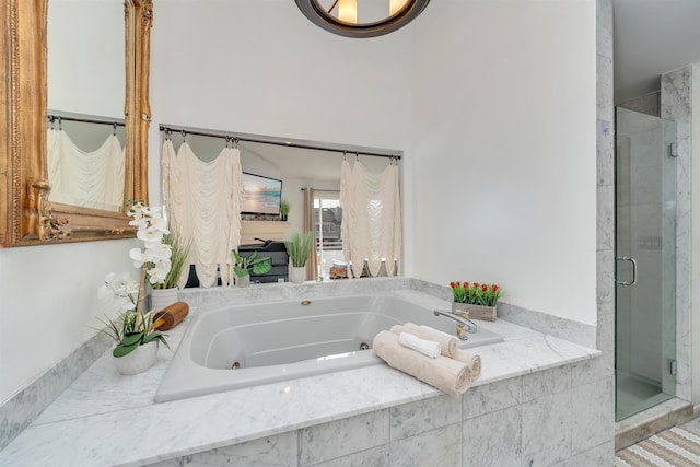 902 Ocean Dr Unit 302, Lower Township, NJ 08204 - full bathroom featuring a stall shower and a jetted tub