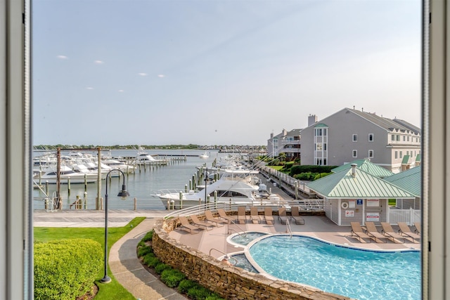 902 Ocean Dr Unit 302, Lower Township, NJ 08204 - community pool with a water view, a patio area, and a boat dock