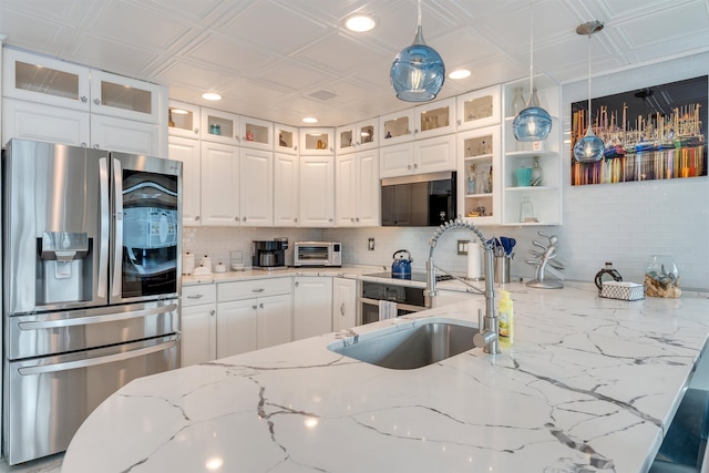 902 Ocean Dr Unit 302, Lower Township, NJ 08204 - kitchen featuring stainless steel refrigerator with ice dispenser, an ornate ceiling, decorative backsplash, white cabinetry, and recessed lighting