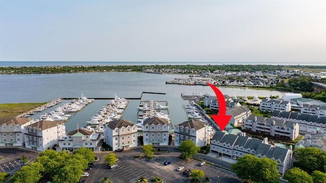 902 Ocean Dr Unit 302, Lower Township, NJ 08204 - drone / aerial view of a nearby body of water and numerous boat docks