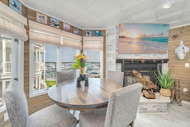 902 Ocean Dr Unit 302, Lower Township, NJ 08204 - dining room featuring wooden walls, an ornate ceiling, and a fireplace