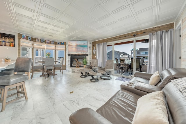 902 Ocean Dr Unit 302, Lower Township, NJ 08204 - living area with a large fireplace, an ornate ceiling, plenty of natural light, and marble finish floors
