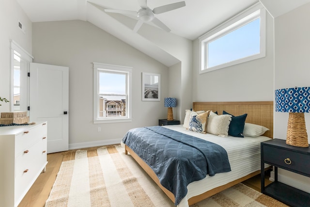 bedroom with ceiling fan and light hardwood / wood-style floors