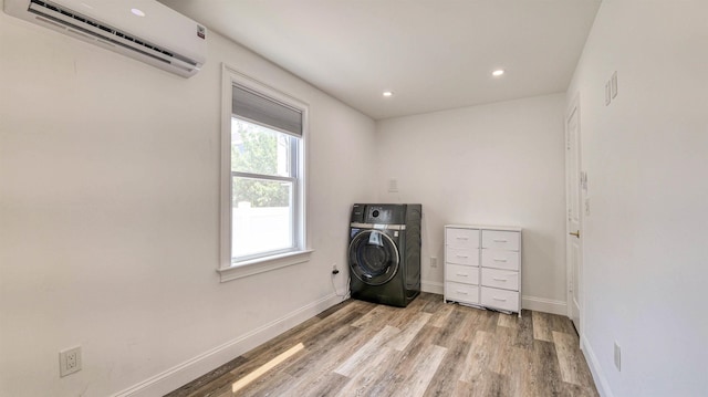 5407 Pacific Ave Unit 13, Wildwood Crest, NJ 08260 - washroom with washer / dryer, a wall mounted AC, light wood finished floors, and recessed lighting