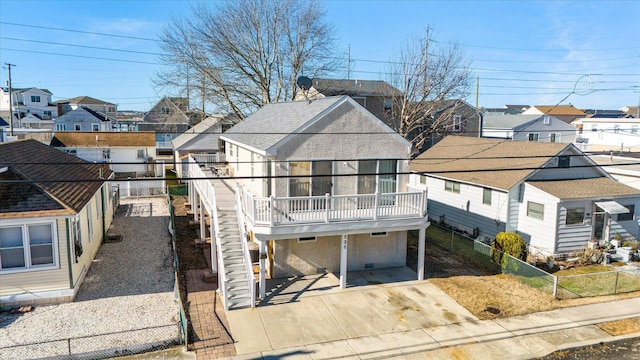 exterior space featuring stairway, a residential view, fence private yard, and a patio area